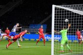 22 May 2020, Berlin: Hertha Berlin's Vedad Ibisevic (L) scores his side's first goal during the German Bundesliga soccer match between Hertha BSC and 1. FC Union Berlin at the Berlin Olympic Stadium. Photo: Stuart Franklin/Getty Images Europe/Pool/dpa - IMPORTANT NOTICE: DFL and DFB regulations prohibit any use of photographs as image sequences and/or quasi-video.