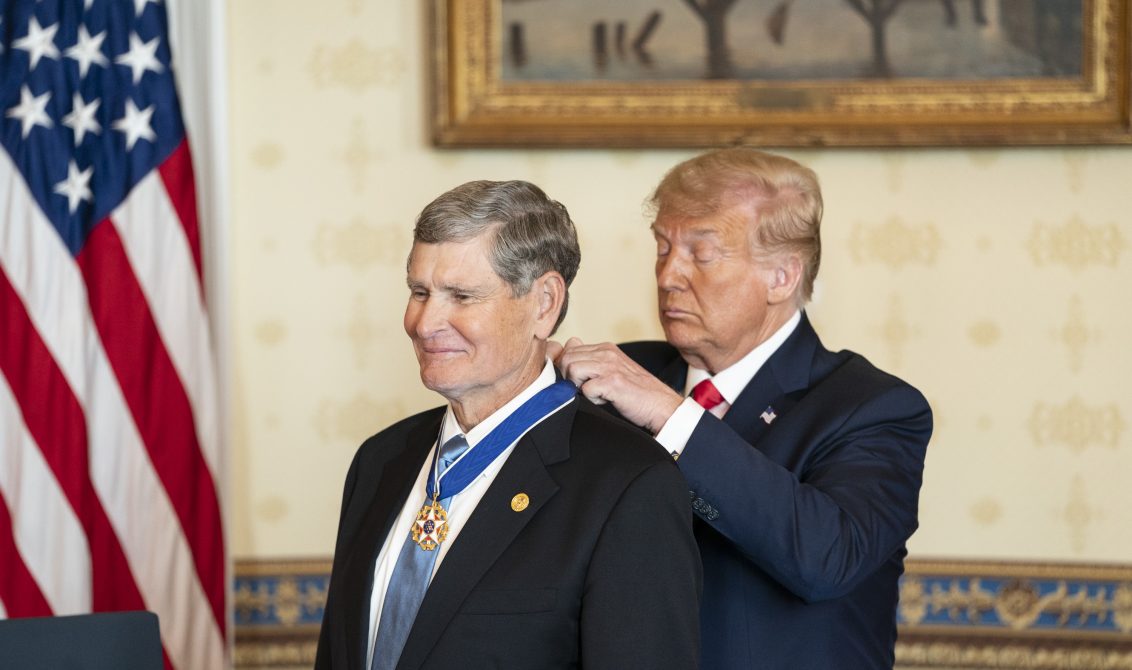 HANDOUT - 24 July 2020, US, Washington: US President Donald Trump presents the Presidential Medal of Freedom to Olympic Silver Medalist and former US Representative Jim Ryun in the Blue Room of the White House. Photo: Joyce Boghosian/White House/dpa - ATTENTION: editorial use only and only if the credit mentioned above is referenced in full