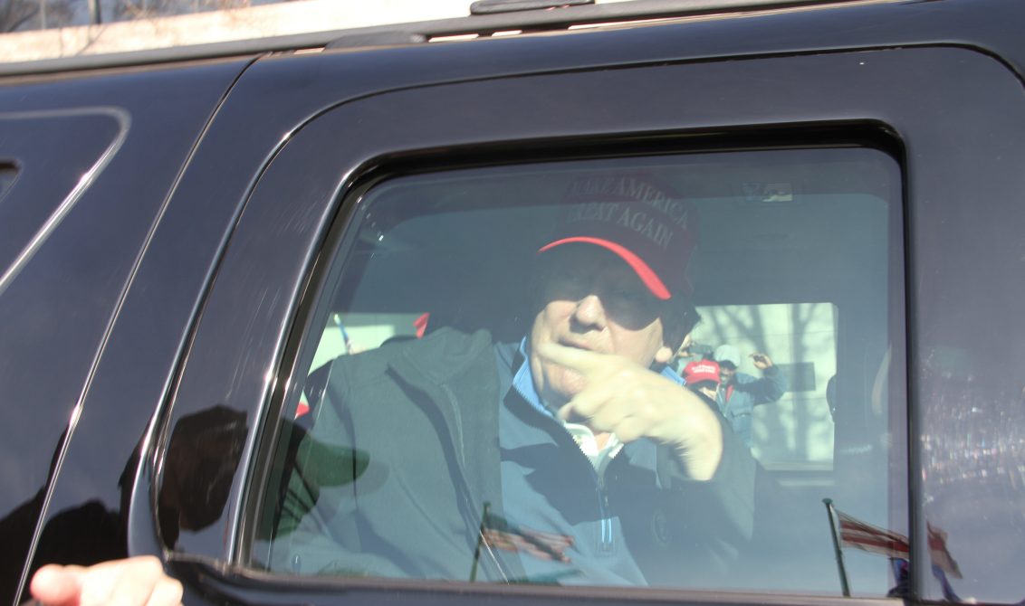 14 November 2020, US, Washington: US President Donald Trump sits inside his car during a protest at Freedom Plaza under the slogan "Make America Great Again" (MAGA) to demonstrate against the alleged manipulation of election results. Photo: Niyi Fote/TheNEWS2 via ZUMA Wire/dpa