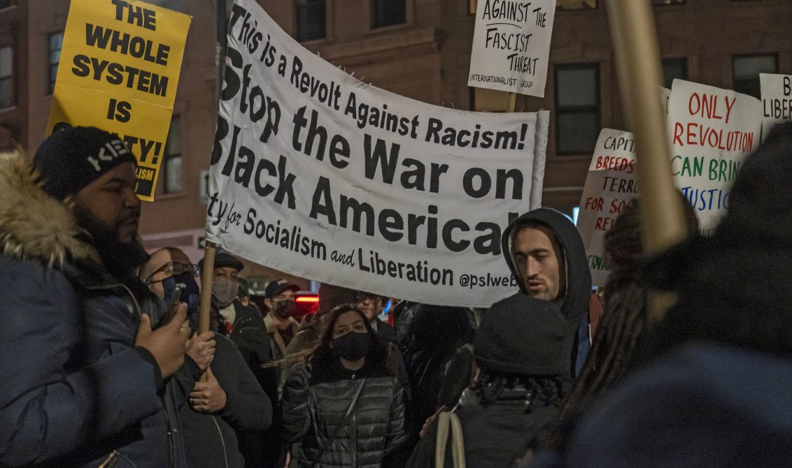19 November 2021, US, New York: People march with placards during a protest in Brooklyn against the acquittal of Kyle Rittenhouse, who shot and killed two men and wounded another during the Kenosha unrest on 25 August 2020. Photo: Ron Adar/SOPA Images via ZUMA Press Wire/dpa