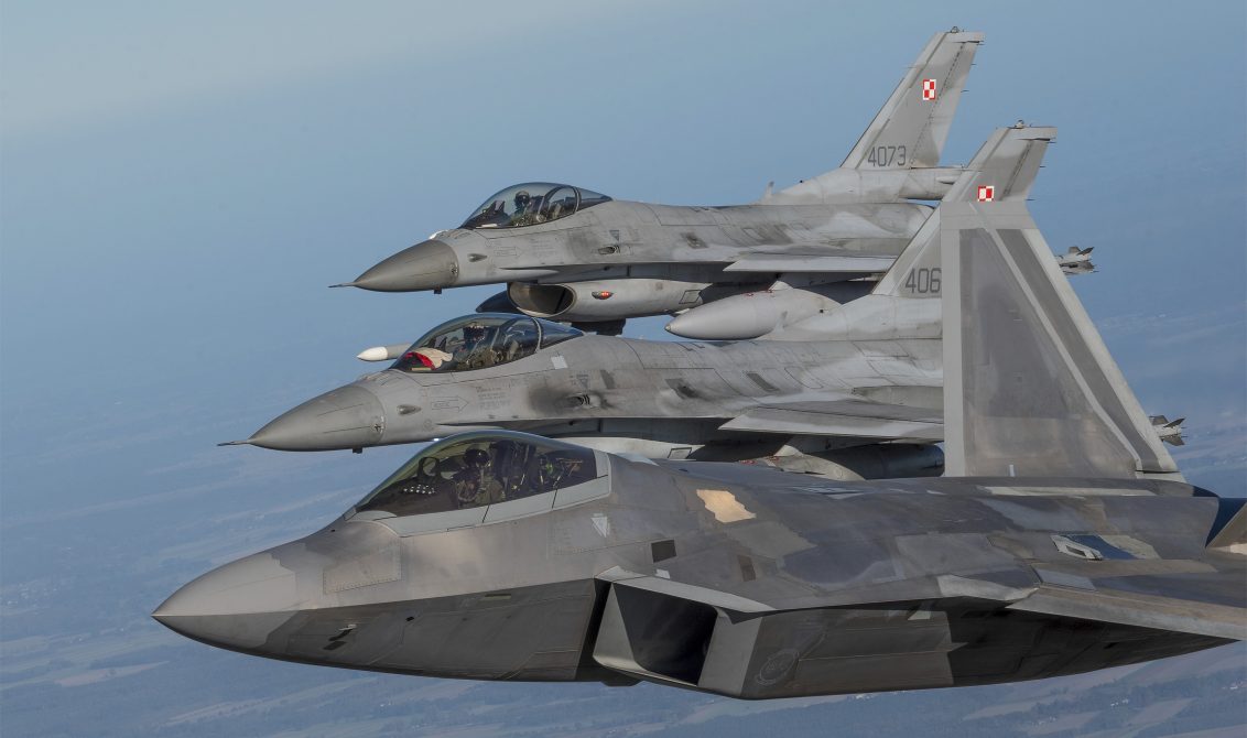 12 October 2022, Poland, Lask: A US Air Force F-22 Raptor fighter aircraft (front) assigned to the 90th Expeditionary Fighter Squadron conduct a NATO Air Shielding Mission with two Polish Air Force F-16 fighters. Photo: Ssgt Danielle Sukhlall/U.S Air via Planet Pix via ZUMA Press Wire/dpa
