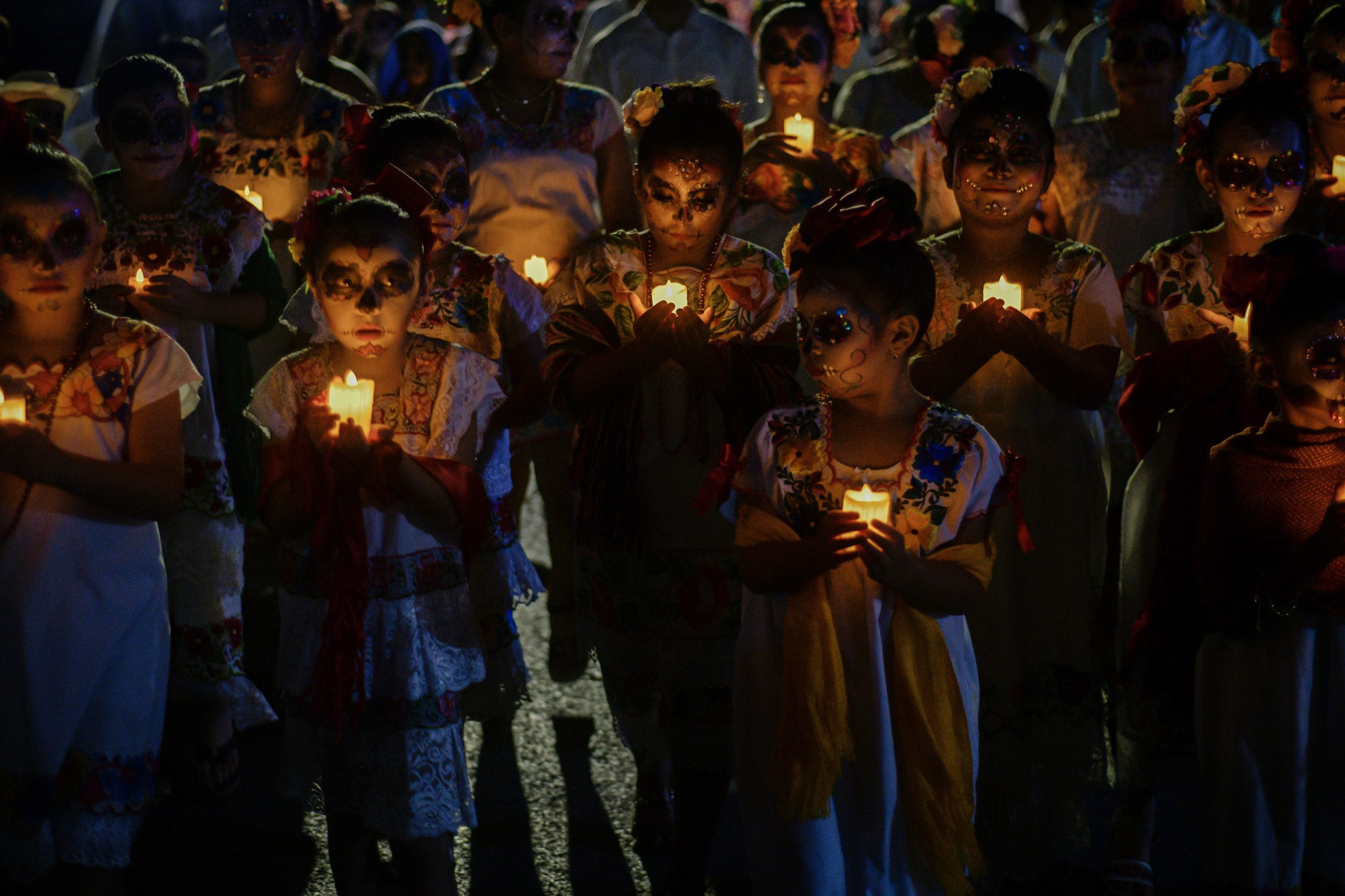 01 November 2022, Mexico, Progreso: Costumed people take part in the "Walk of the Souls" during Mexico's Day of the Dead. Photo: Mariana Gutierrez/eyepix via ZUMA Press Wire/dpa