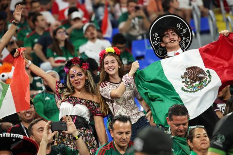 22 November 2022, Qatar, Doha: Fans of Mexico cheer in the stands ahead of the FIFA World Cup Qatar 2022 Group C soccer match between Mexico and Poland at Stadium 974. Photo: Christian Charisius/dpa