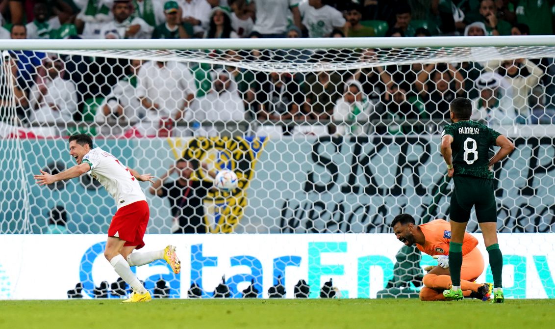 26 November 2022, Qatar, Al Rayyan: Poland's Robert Lewandowski celebrates scoring his side's second goal during the FIFA World Cup Qatar 2022 Group C soccer match between Poland and Saudi Arabia at the Education City Stadium in Doha. Photo: Adam Davy/PA Wire/dpa