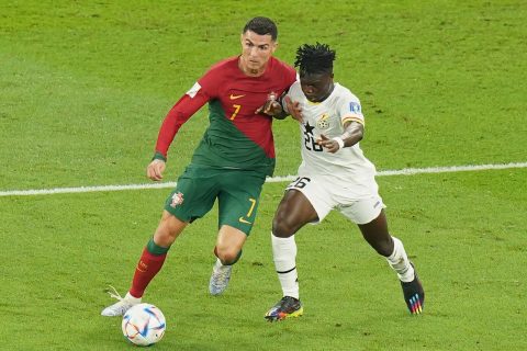 24 November 2022, Qatar, Doha: Portugal's Cristiano Ronaldo (L) and Ghana's Alidu Seidu battle for the ball during the FIFA World Cup Qatar 2022 Group H soccer match between Portugal and Ghana at Stadium 974. Photo: Adam Davy/PA Wire/dpa