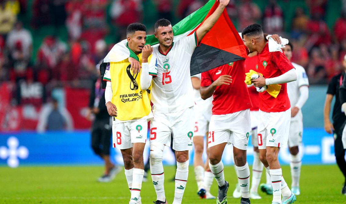 01 December 2022, Qatar, Doha: Morocco's Azzedine Ounahi (L) and Selim Amallah celebrate at the end of the FIFA World Cup Qatar 2022 Group F soccer match between Canada and Morocco at Al Thumama Stadium. Photo: Mike Egerton/PA Wire/dpa