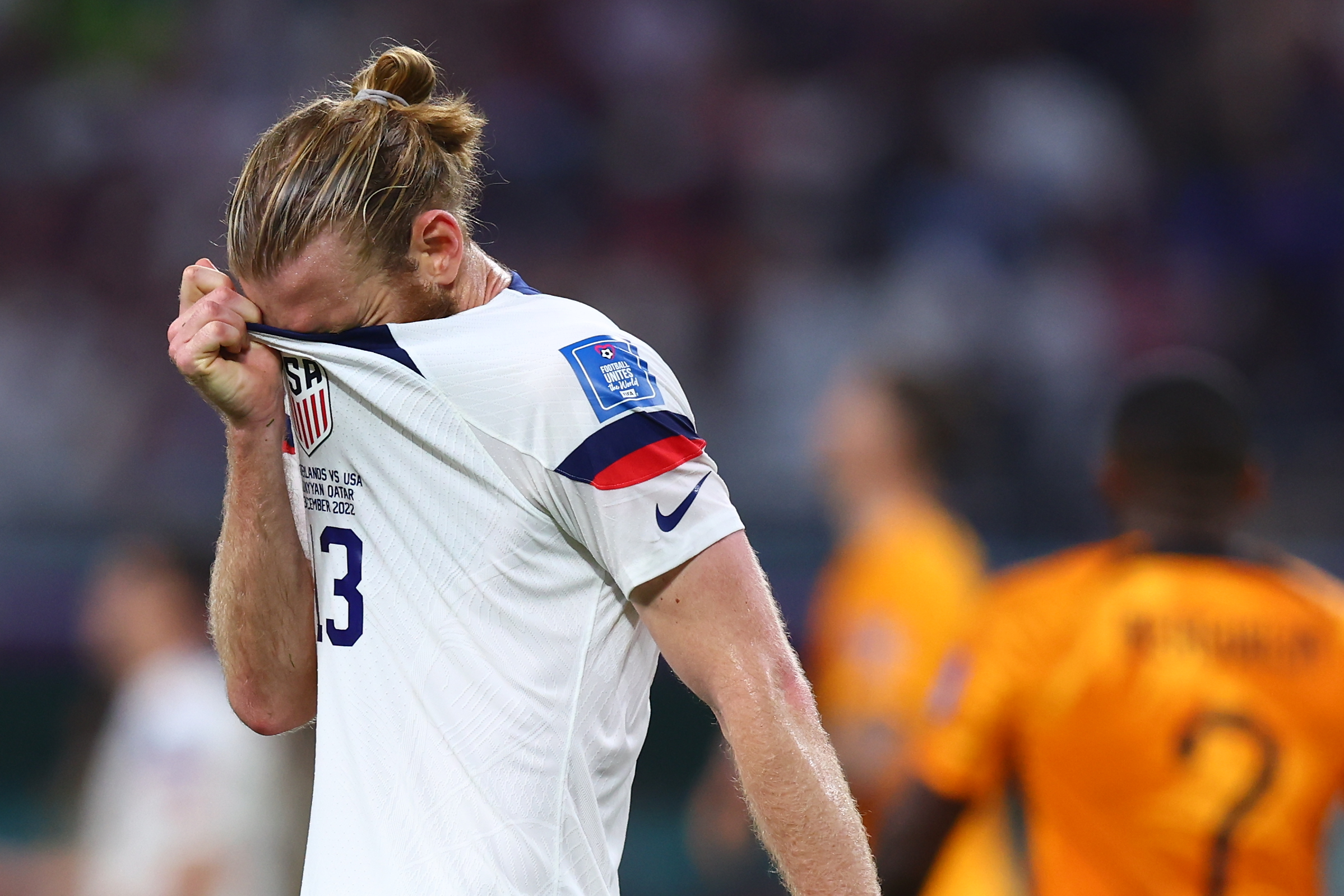 03 December 2022, Qatar, Al Rayyan: USA's Walker Zimmerman reacts in frustration to defeat after his side's elimination, following the final whistle of the FIFA World Cup Qatar 2022 round of 16 soccer match between the Netherlands and USA at the Khalifa International Stadium. Photo: Tom Weller/dpa