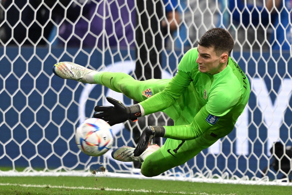 05 December 2022, Qatar, Al-Wakra: Croatia's goalkeeper Dominik Livakovic saves a penalty kick during of the FIFA World Cup Qatar 2022 Round of 16 soccer match between Japan and Croatia at Al Janoub Stadium. Photo: Robert Michael/dpa