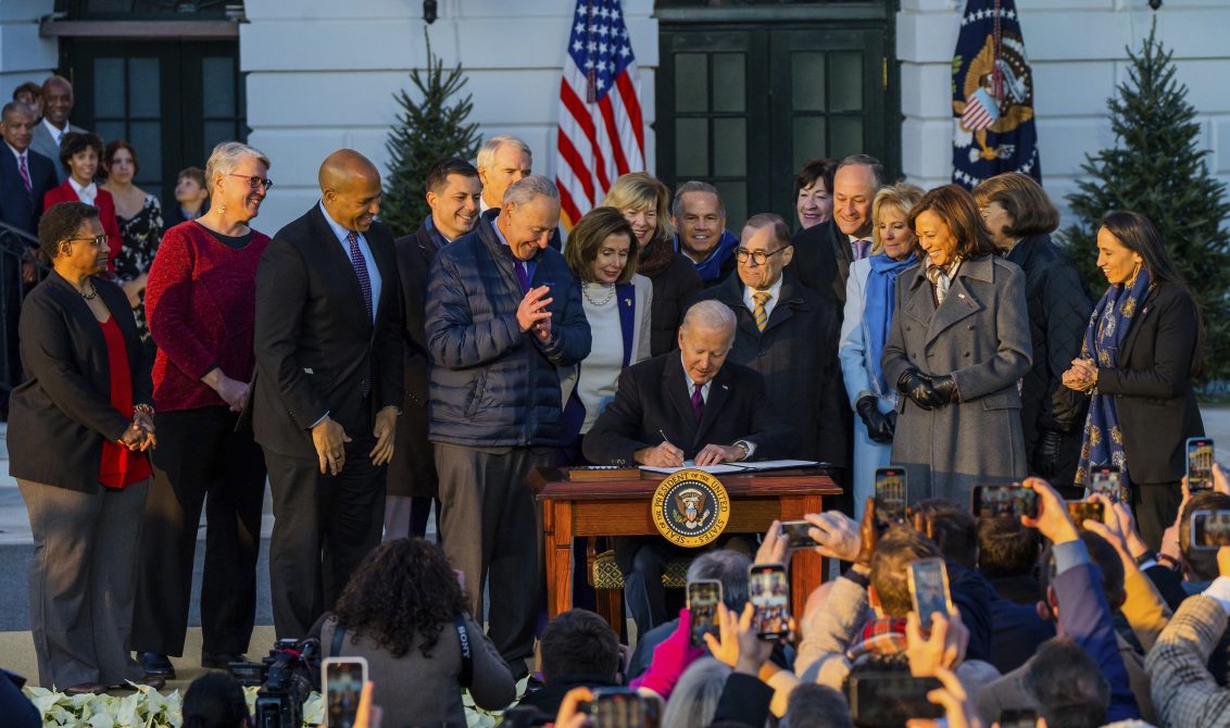 13 December 2022, US, Washington: US President Joe Biden with Vice President Kamala Harris and members of Congress signs the Respect for Marriage Act on the South Lawn of the White House. The law now guarantees federal recognition of same-sex and interracial marriages nationwide. Photo: Adam Schultz/Planet Pix via ZUMA Press Wire/dpa