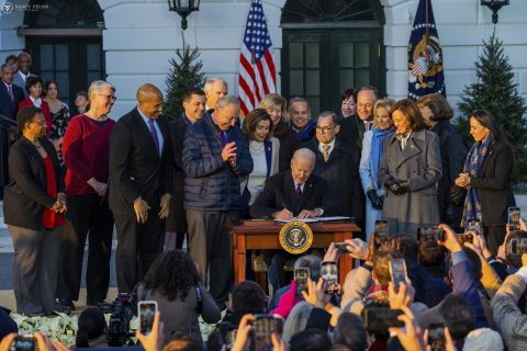 13 December 2022, US, Washington: US President Joe Biden with Vice President Kamala Harris and members of Congress signs the Respect for Marriage Act on the South Lawn of the White House. The law now guarantees federal recognition of same-sex and interracial marriages nationwide. Photo: Adam Schultz/Planet Pix via ZUMA Press Wire/dpa